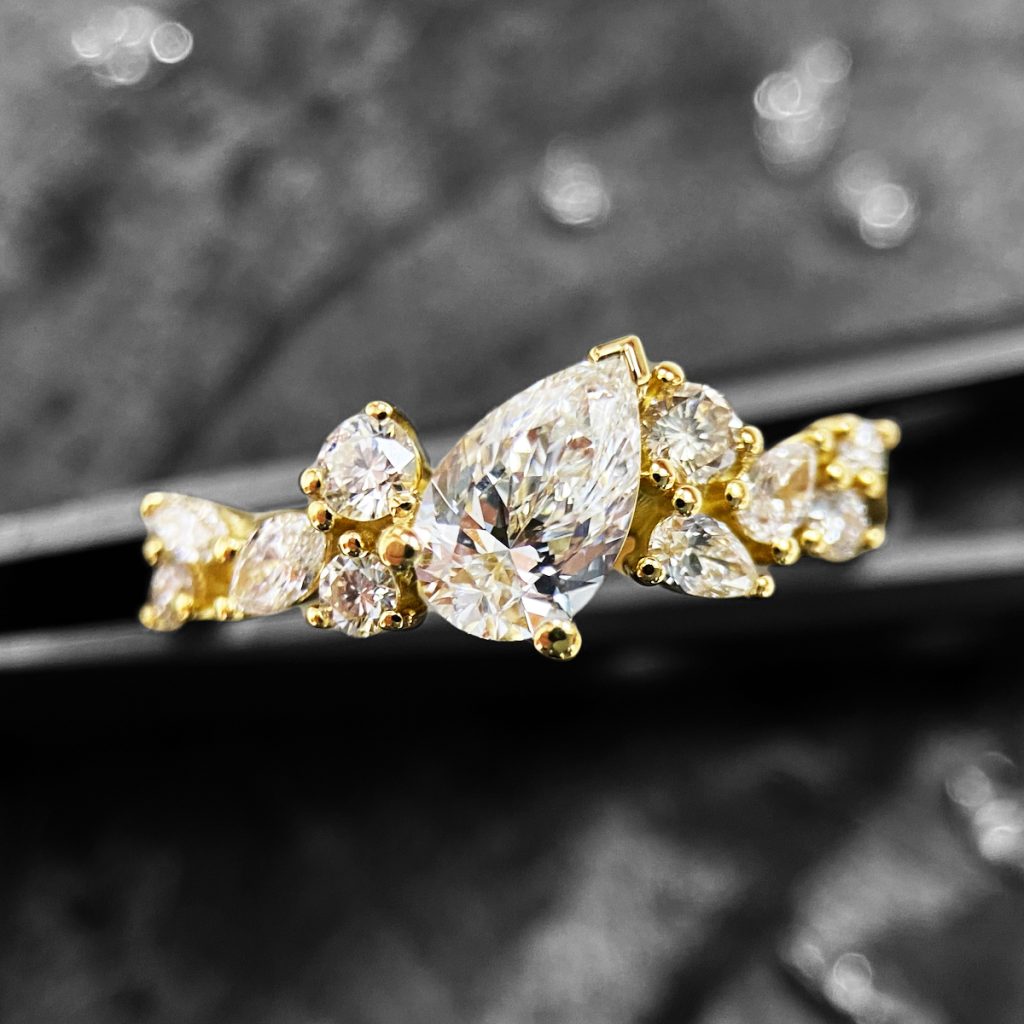 multi-stone-diamond-unique-yellow-gold-engagement-ring.jpg
